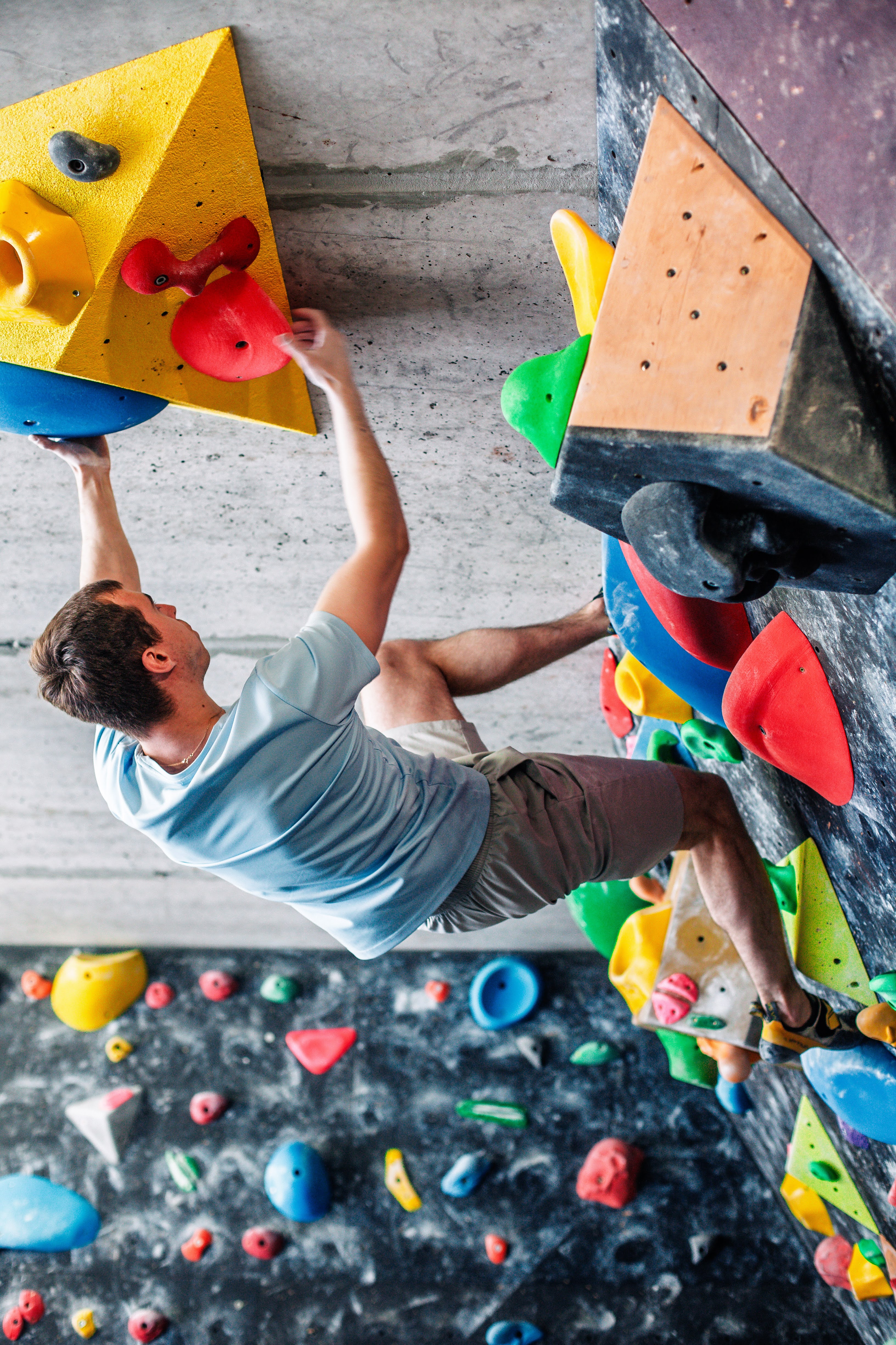 Climber preparing and fitting climbing shoes